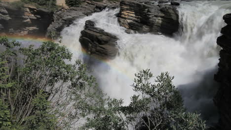 Canadian-Rockies-Jasper-NP-Athabasca-Falls-with-rainbow-c