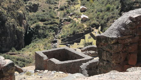 Peru-Pisac-stone-cubicle-and-rugged-valley-floor-5