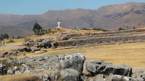 Peru-Sacsayhuaman-rows-of-walls-white-cross-and-hills-5