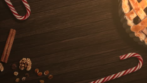 Animierte-Nahaufnahme-Süßigkeiten-Und-Weihnachtskuchen-Auf-Holz-Hintergrund-1