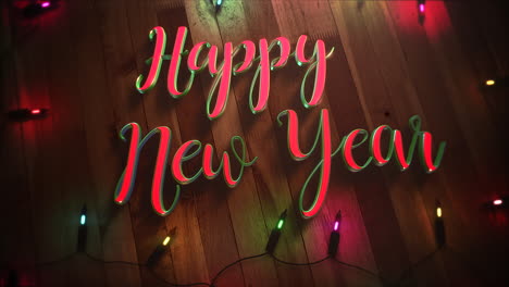 Happy-New-Year-text-and-colorful-garland-on-wood-background