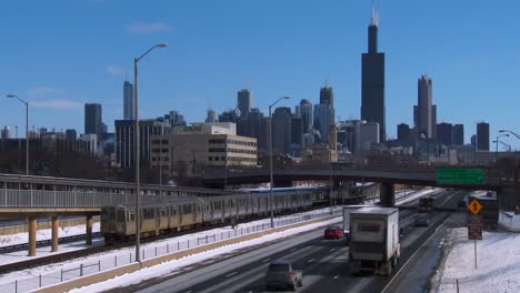Cars-travel-on-a-freeway-into-Chicago-in-winter-2