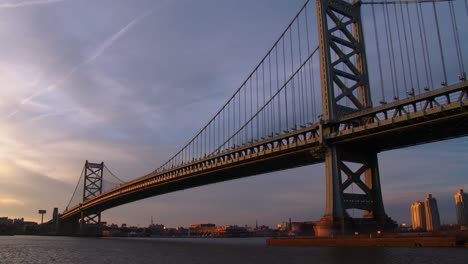 The-Ben-Franklin-Bridge-near-Philadelphia-PA-glows-in-sunset-light