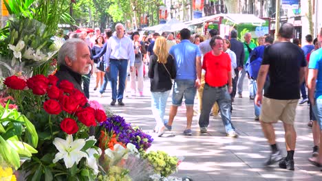 Crowds-walk-in-a-neighborhood-in-Barcelona-Spain-2