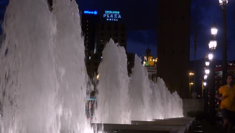 Fountains-dance-in-Barcelona-Spain-with-a-hotel-background