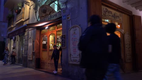 Classic-establishing-shot-of-a-bar-or-cafe-at-night-in-European-style