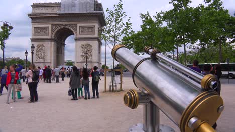 The-Arc-De-Triompne-in-Paris-with-a-telescope-viewer-foreground