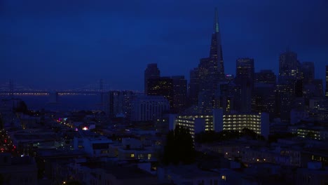 Establishing-shot-of-San-Francisco-California-at-night-with-Bay-Bridge-background-3