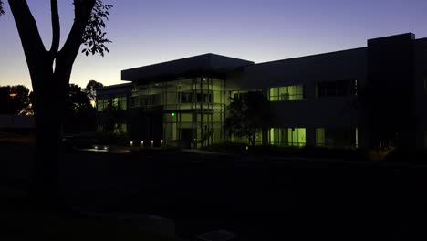 Establishing-shot-of-the-exterior-of-a-generic-modern-office-building-at-night-3
