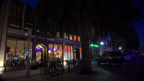 Establishing-shot-of-a-small-retail-business-district-at-night-2