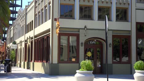 Establishing-shot-of-a-small-retail-business-district-with-shops