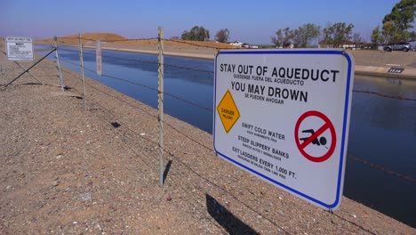 Signs-warn-people-to-stay-out-of-the-California-aqueduct