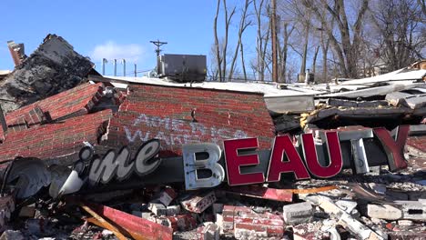 The-ruins-of-a-destroyed-beauty-salon-following-rioting--in-Ferguson-Missouri-make-an-ironic-statement--2
