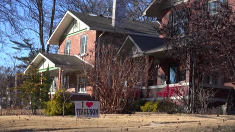 Residents-of-Ferguson-Missouri-displays-signs-supporting-their-community-following-severe-racial-tension-and-rioting-in-2014