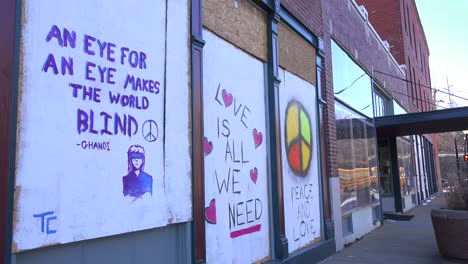 Residents-of-Ferguson-Missouri-displays-signs-supporting-their-community-following-severe-racial-tension-and-rioting-in-2014-2