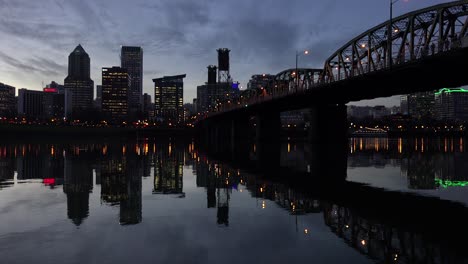 Evening-shot-of-a-bridge-over-the-Willamette-River-with-Portland-Oregon-background-1