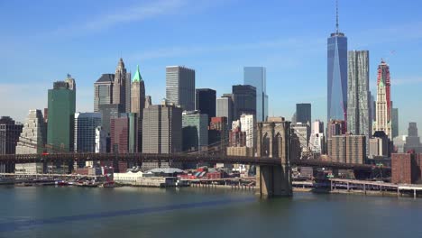 Nice-establishing-shot-of-New-York-City-financial-district-with-Brooklyn-Bridge-foreground-2