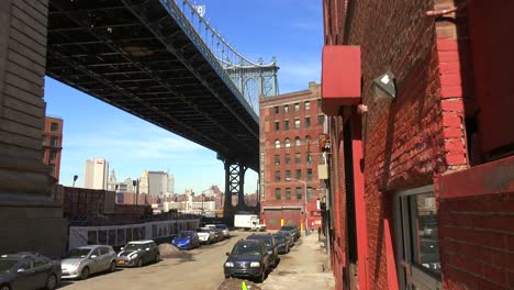 An-establishing-shot-of-the-Dumbo-area-of-Brooklyn-New-York-including-the-Brooklyn-bridge