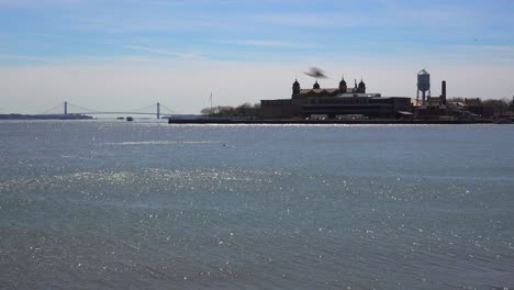 A-distant-view-of-Ellis-Island-in-new-York-harborimmigrants-from-Ellis-Island