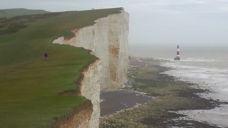 A-lighthouse-along-the-White-Cliffs-of-Dover-near-Beachy-Head-in-Southern-England-3