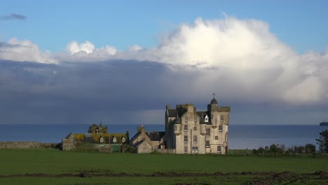 Establishing-shot-of-a-beautiful-Scottish-or-English-castle-estate-in-sunset-light