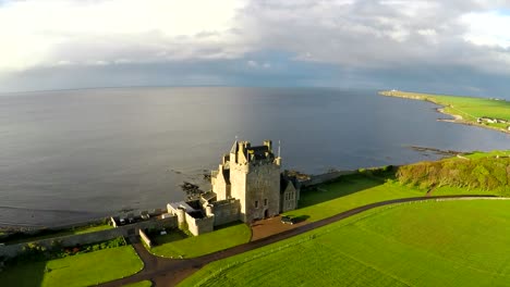 An-aerial-of-a-beautiful-Scottish-or-English-castle-estate-in-sunset-light