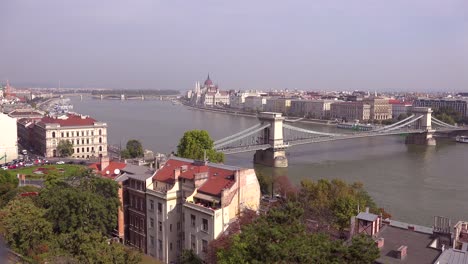 Budapest-Hungary-and-Parliament-as-barges-move-along-the-Danube-River-1