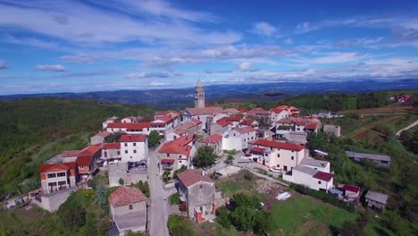 Gorgeous-aerial-of-a-small-Croatian-or-Italian-hill-town-or-village