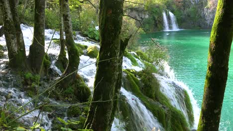 Beautiful-waterfalls-flow-through-lush-green-jungle-at-Plitvice-National-Park-in-Croatia-3
