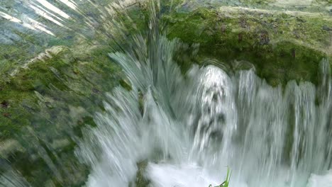 Beautiful-waterfalls-flow-through-lush-green-jungle-at-Plitvice-National-Park-in-Croatia-4