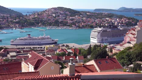 A-giant-cruise-ship-is-docked-in-the-bay-in-the-old-city-of-Dubrovnik-Croatia-1