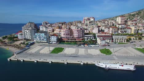 Nice-aerial-shot-of-the-resort-town-of-Sarande-on-the-coast-of-Albania-3