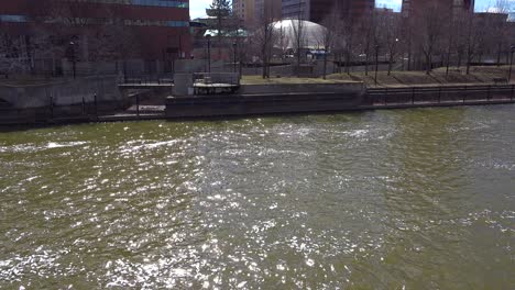 Tilt-up-of-polluted-water-flowing-from-the-Flint-River-through-Flint-Michigan-during-their-water-crisis