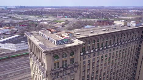Sweeping-aerial-of-the-exterior-of-the-abandoned-central-train-station-in-Detroit-Michigan