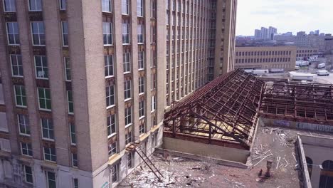 Slow-rising-aerial-of-the-exterior-of-the-abandoned-central-train-station-in-Detroit-Michigan