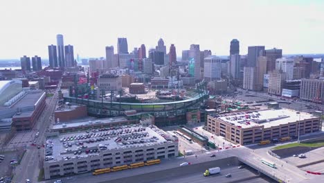 Aerial-shot-over-the-city-of-Detroit-with-Ford-Field-and-the-GM-tower-in-the-background