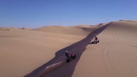 Dune-buggies-and-ATVs-race-across-the-Imperial-Sand-Dunes-in-California-1