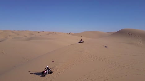 Dune-buggies-and-ATVs-race-across-the-Imperial-Sand-Dunes-in-California-2