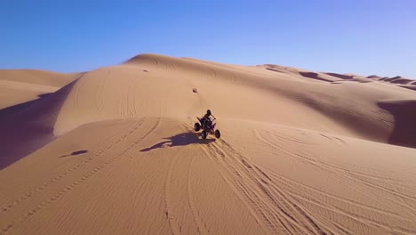 Dune-buggies-and-ATVs-race-across-the-Imperial-Sand-Dunes-in-California-8