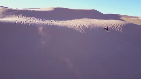 Dune-buggies-and-ATVs-race-across-the-Imperial-Sand-Dunes-in-California-13