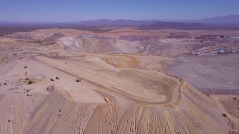 An-aerial-over-a-vast-open-pit-strip-mine-in-the-Arizona-desert-1