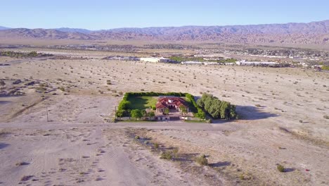 A-dramatic-aerial-reveals-a-large-mansion-in-miles-of-lonely-desert-2