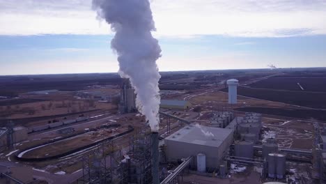 An-aerial-shot-over-an-oil-refinery-spewing-pollution-into-the-air-1