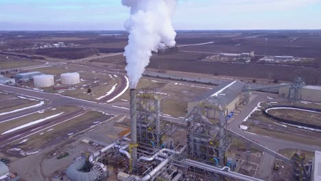 An-aerial-shot-over-an-oil-refinery-spewing-pollution-into-the-air-2