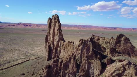 A-beautiful-aerial-around-a-rock-formation-near-Monument-Valley