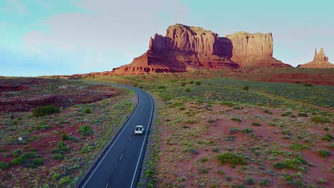 An-vista-aérea-over-a-truck-traveling-on-a-road-through-Navajo-country-in-Arizona