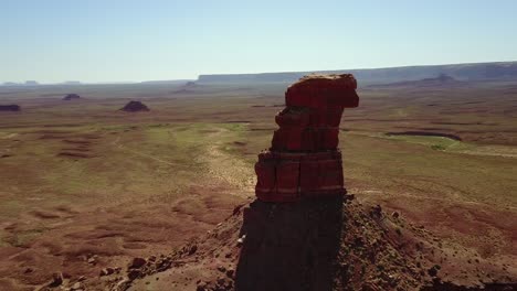 Incredible-aerial-around-the-buttes-and-rock-formations-of-Monument-Valley-Utah-1