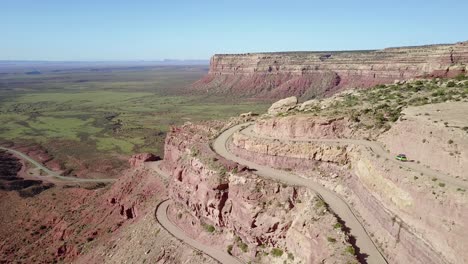 Aerial-as-a-car-travels-on-the-dangerous-mountain-road-of-Moki-Dugway-New-Mexico-desert-Southwest-5