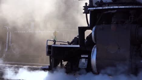 Low-angle-of-Cumbres-and-Toltec-steam-train-leaving-station-1