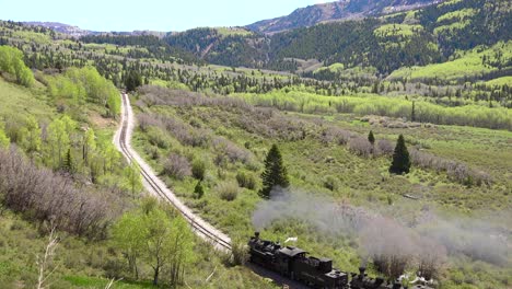 Low-of-the-Cumbres-and-Toltec-steam-train-moving-through-Colorado-mountains-near-Chama-New-Mexico-2